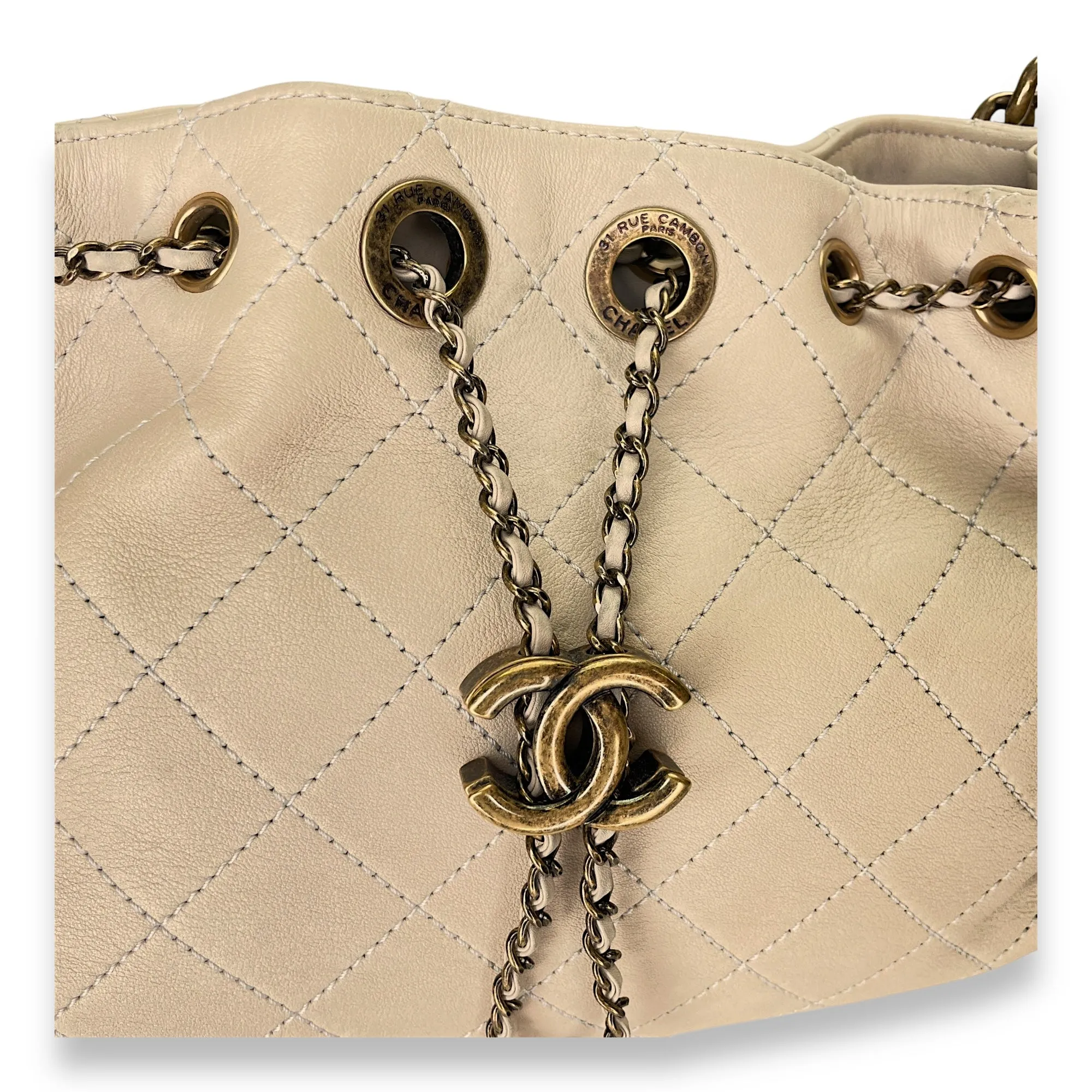 Drawstring CC Beige Bucket Bag in Calfskin, Gold hardware