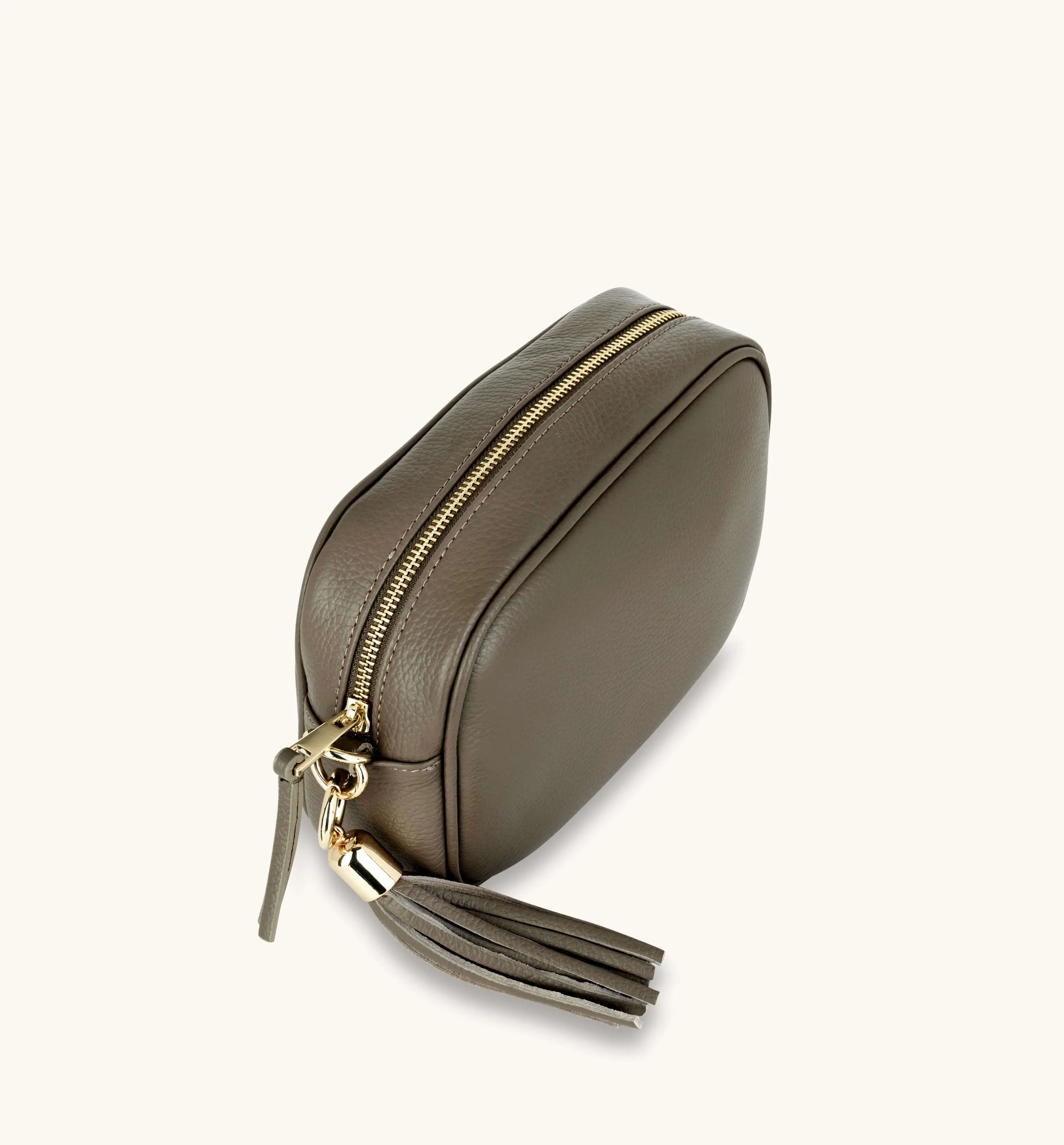 The Tassel Latte Leather Crossbody Bag With Gold Chain Strap